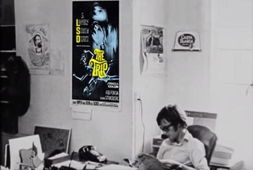 Theatrical poster of The Trip on the wall of Peter's office.jpg